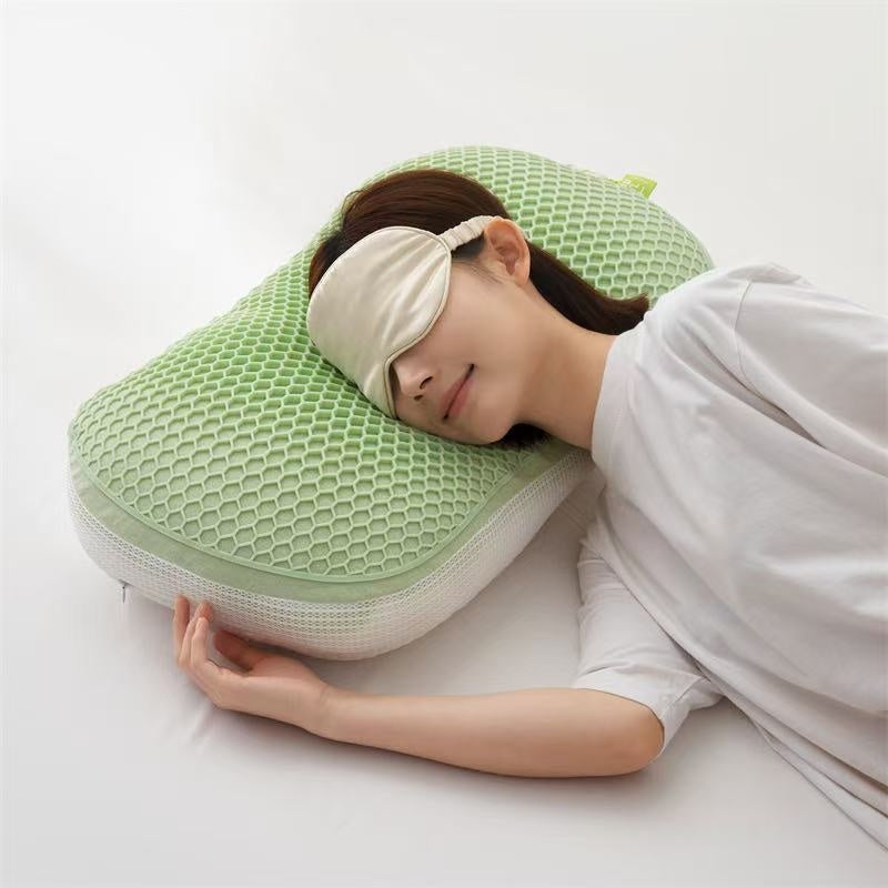 Washable TPE pressure release pectin pillow in green with honeycomb design.