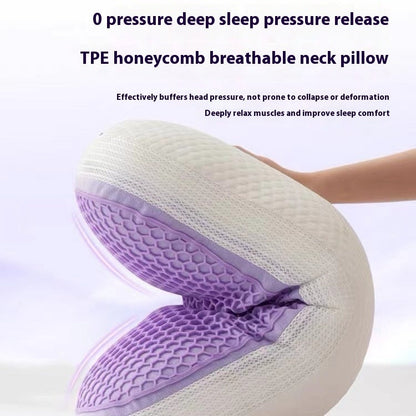 Washable TPE pressure release pillow with breathable honeycomb design and purple highlights.